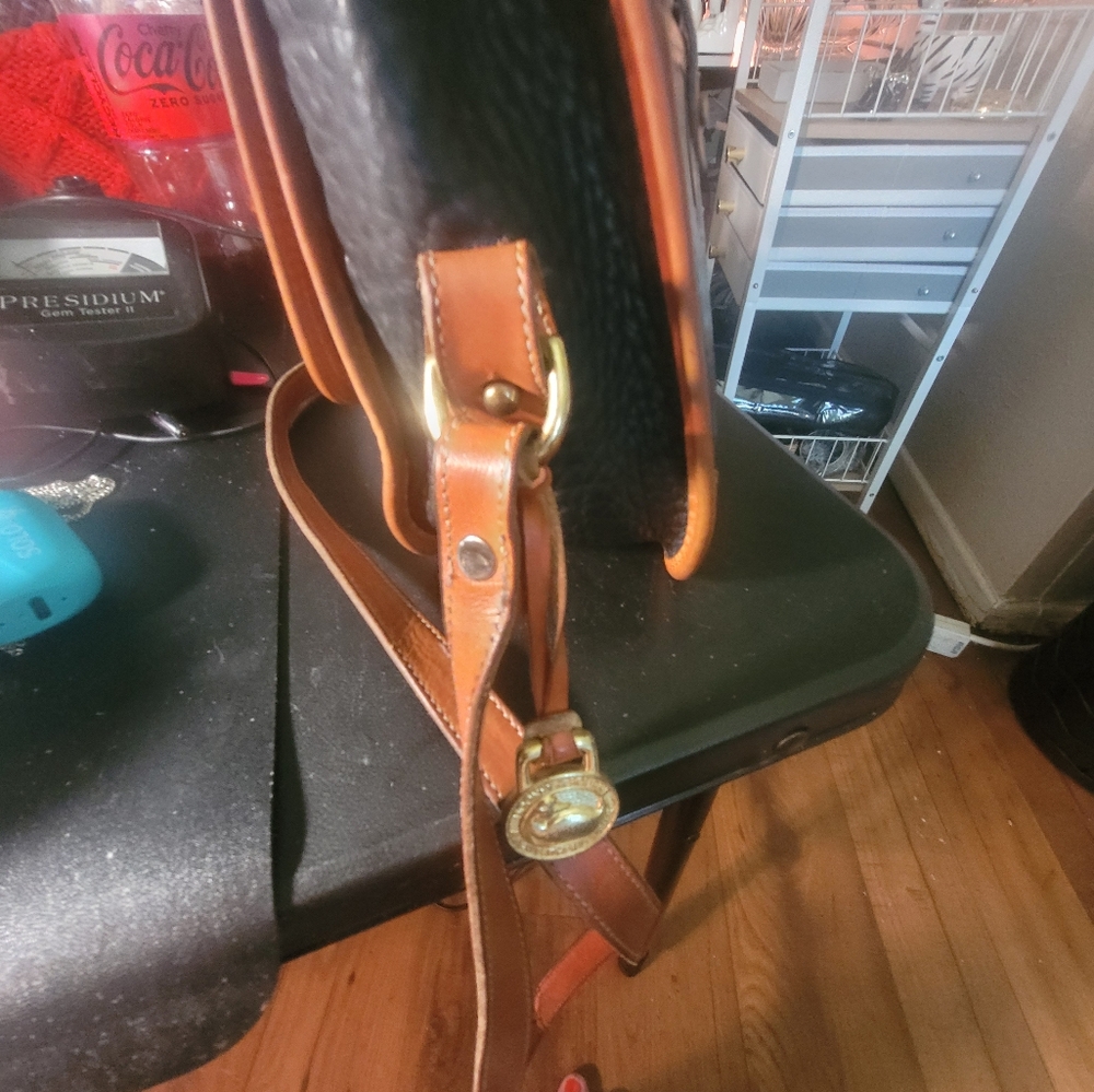 Dooney & Bourke Black and Brown Messenger Bag with Buckle Closure - Picture 15 of 16